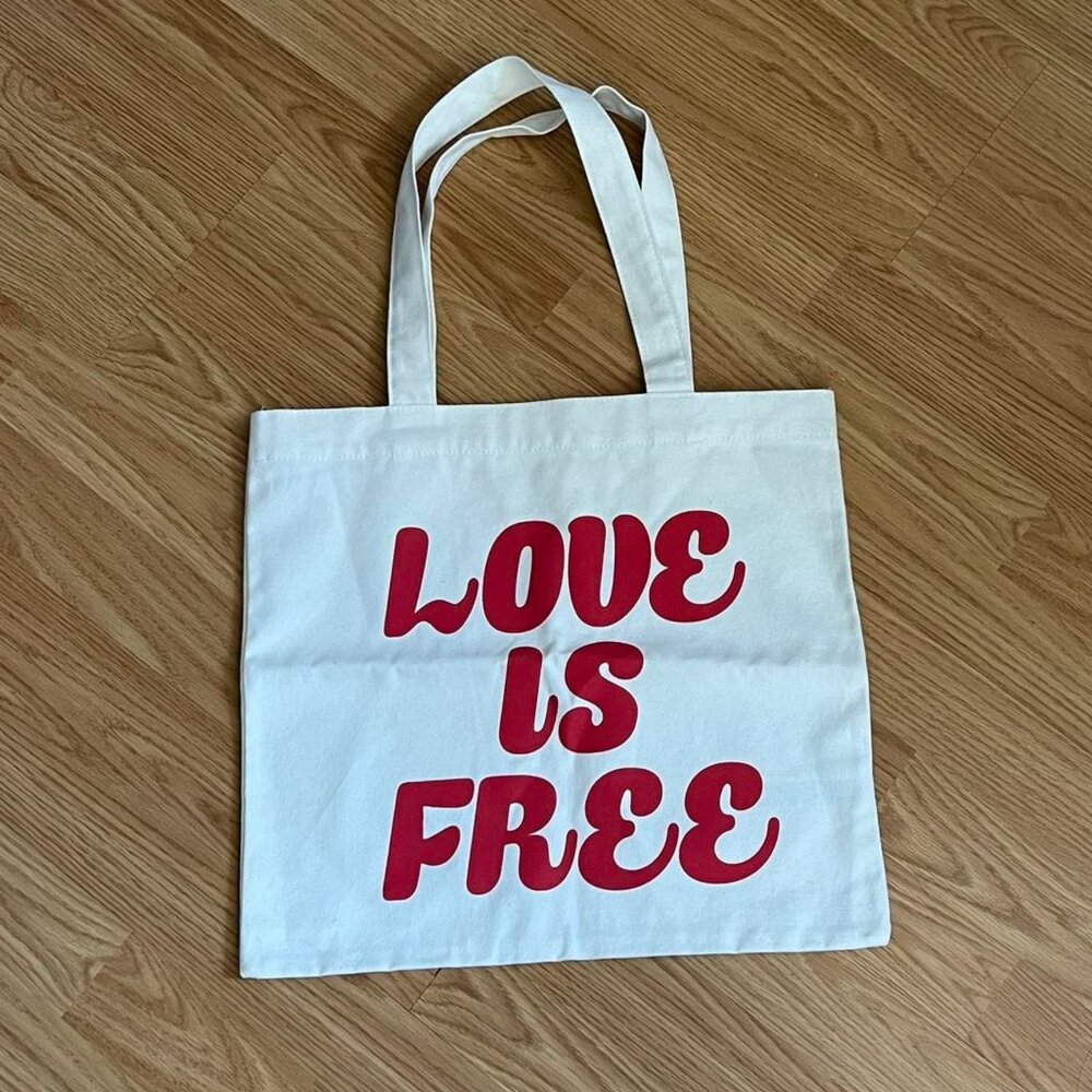 ❤️ “LOVE IS FREE” White tote bag with red lettering! ❤️